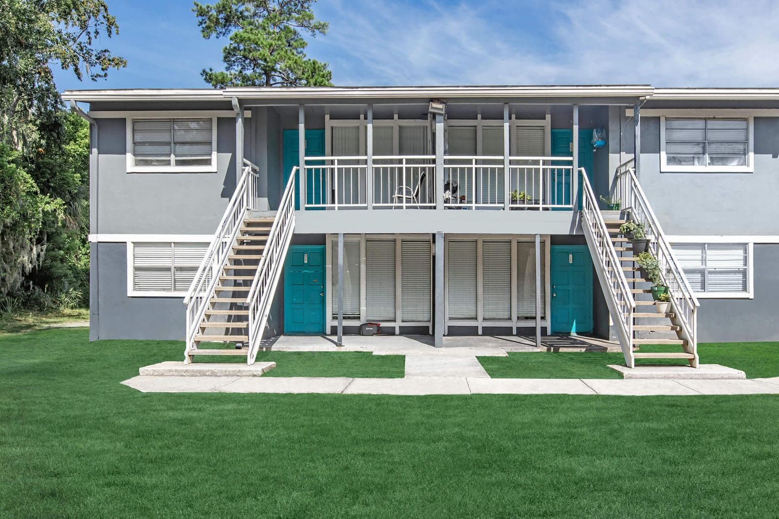 Two-story multifamily building after exterior improvements